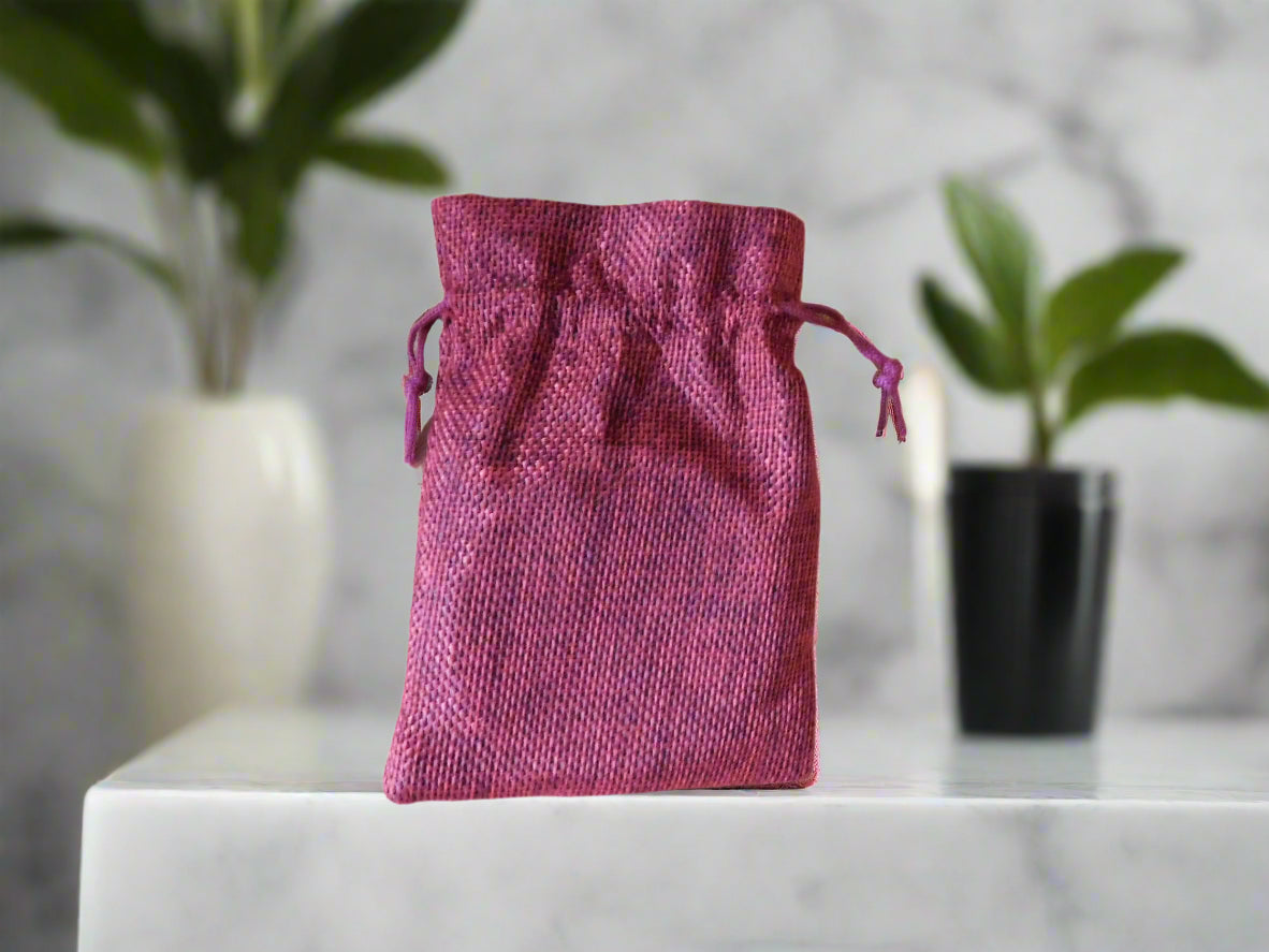 Red cotton bag on the top of a marble counter