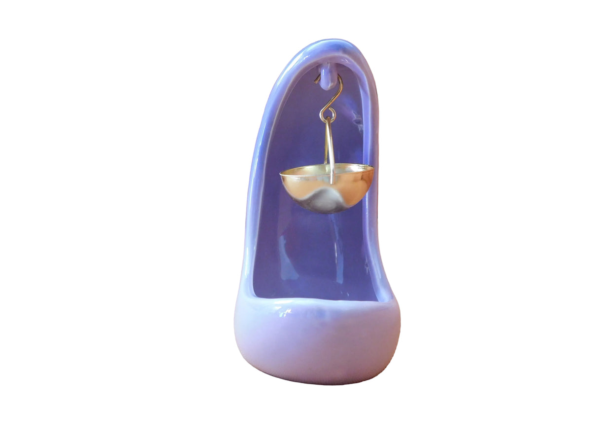 Front view of the purple half moon burner
