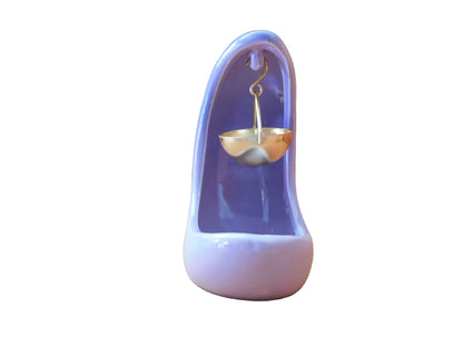 Front view of the purple half moon burner