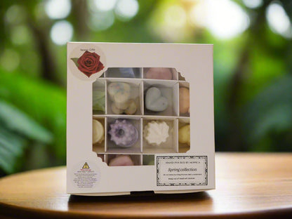 A gift box containing multiple soya wax melts in various colors, with a label indicating the spring collection.